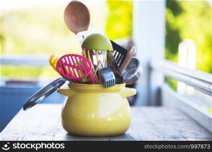 the Kitchen Tools in the garden on a wooden table
