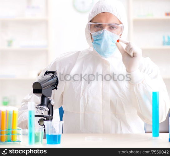 The lab assistant in drug synthesis concept. Lab assistant in drug synthesis concept