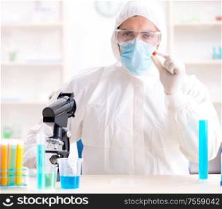 The lab assistant in drug synthesis concept. Lab assistant in drug synthesis concept
