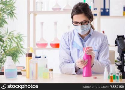 The lab chemist checking beauty and make-up products. Lab chemist checking beauty and make-up products