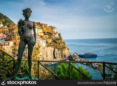 The Lady of the Grapes statue at town center of Manarola, Cinque Terre - Italy.