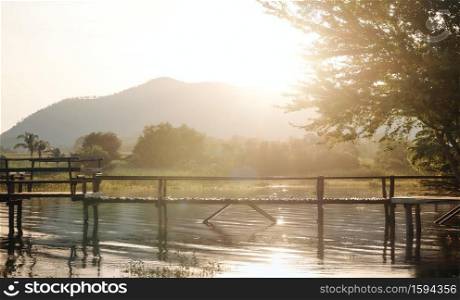 The landscape of Lam Taphoen reservoir at sunrise in Suphan Buri province, Thailand