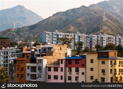 The landscape of residential buildings in the mountains. Nansa, Yunnan, China.
