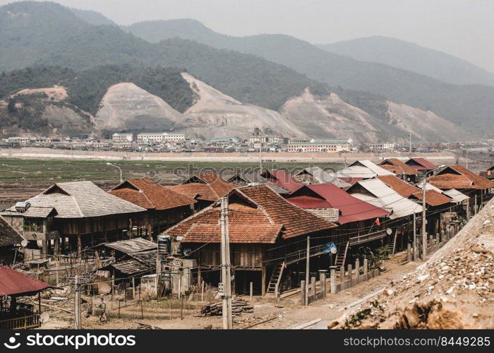 The landscape of the Ban Chat hydropower plant, Tai ethnic ancient villages rebuilt on a construction site. Vietnam.
