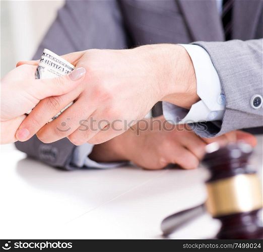 The lawyer being offered bribe for his services. Lawyer being offered bribe for his services