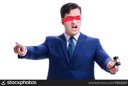 The lawyer with blindfold holding a gavel isolated on white. Lawyer with blindfold holding a gavel isolated on white
