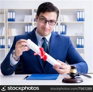 The laywer with diploma roll in legal profession eductional concept. Laywer with diploma roll in legal profession eductional concept