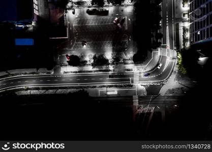 The light on the road at night and the city in Warsaw Road beautiful. Aerial view. Top view. Background scenic road. curves road drone