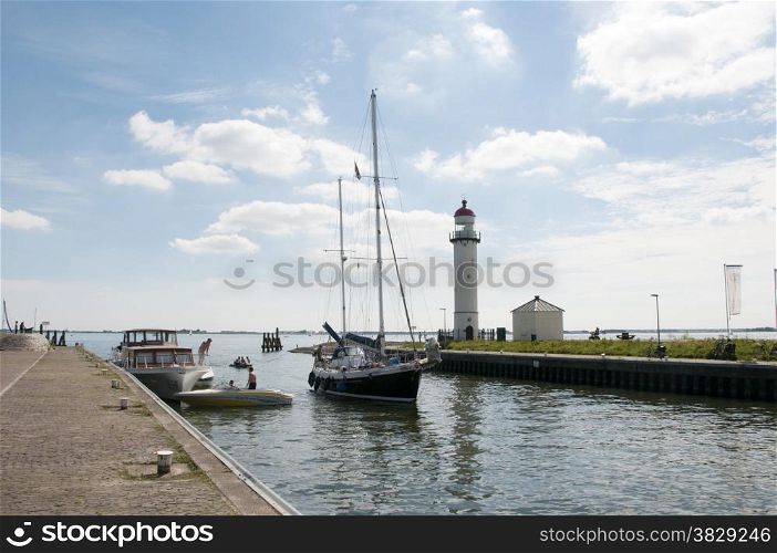 the lighthouse in the harbour in holland called Hellevoetsluis