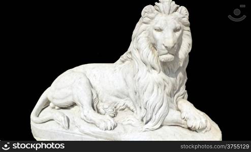 the lion statue in siting position isolated with black background