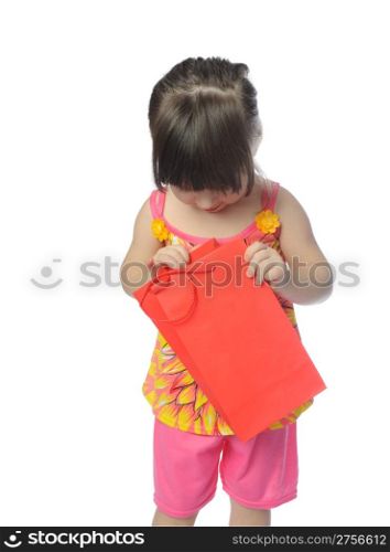 The little girl with color package. It is isolated on a white background
