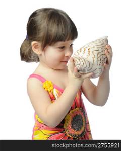 The little girl with seashell. It is isolated on a white background