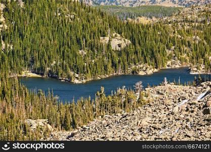 The Loch Lake, Rocky Mountains, Colorado, USA. . The Loch Lake with rocks and mountains around at autumn. Rocky Mountain National Park in Colorado, USA.