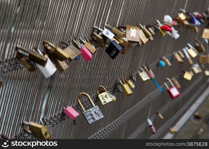 The locks at the fence of Pont des Arts in Paris