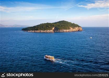 The Lokrum Island at sunset on the Adriatic Sea in Croatia, view from the Dubrovnik city.