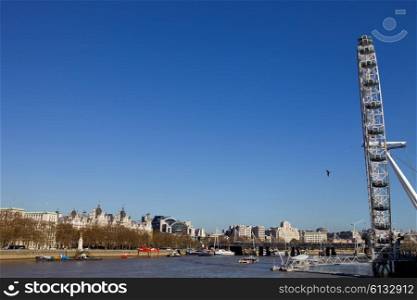 the london eye and the thames river in london
