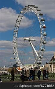 The London Eye is a giant Ferris wheel on the South Bank of the River Thames in London.