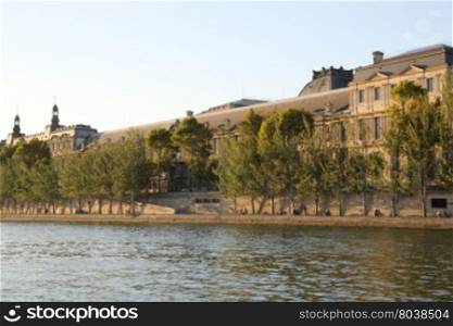 The Louvre across the Seine River in Paris France
