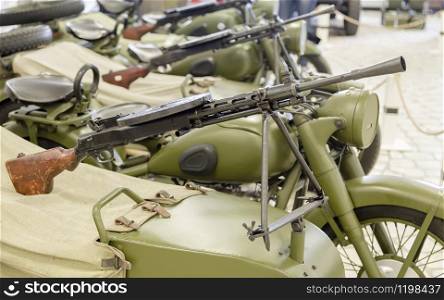The machine gun from World War II fixed to the sidecar