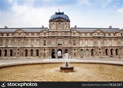 The main entrance of Louvre museum Paris