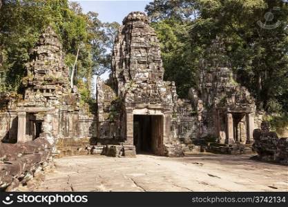 The main entrance to the Preah Khan temple near Angkor Wat in Cambodia consists of three towers.&#xA;