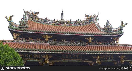 The main pagoda of the Mengjia Longshan Temple in Taipei is one of the oldest buildings in Taiwan and is covered with ornate decorative creatures including dragons and phoenixes. The traditional temple supports several religions including Buddhism, Taoism and Matsu.