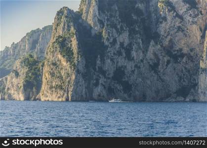 The majesty of the Amalfi coast compared to a passenger boat.