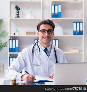 The male and female doctor having discussion in hospital. Male and female doctor having discussion in hospital