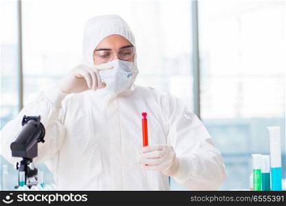 The male chemist working in lab. Male chemist working in lab