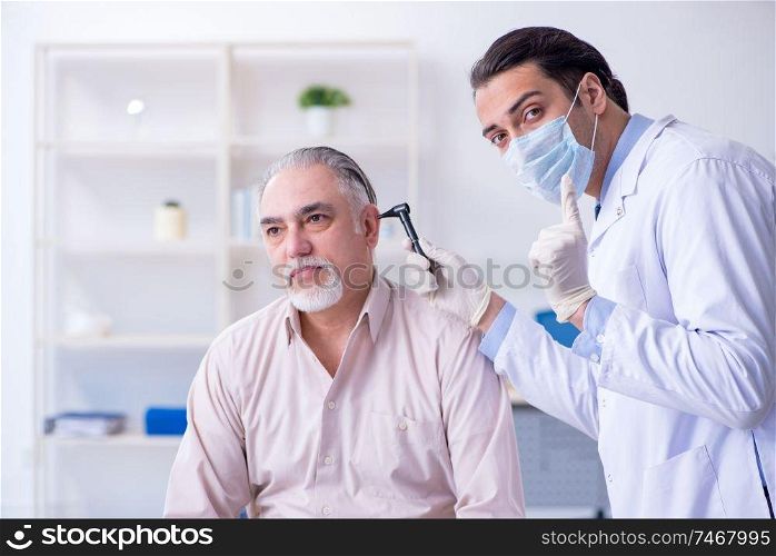 The male patient visiting doctor otolaryngologist. Male patient visiting doctor otolaryngologist