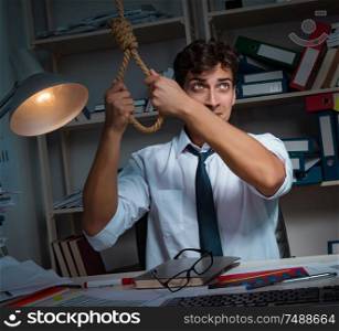 The man businessman working late hours in the office. Man businessman working late hours in the office