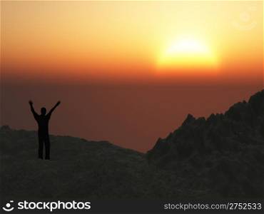 The man on mountain. The lifted hands, towards to picturesque sunset