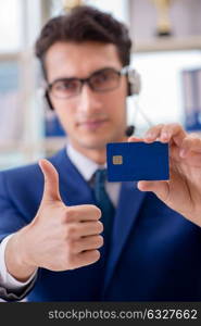 The man paying with credit card online. Man paying with credit card online