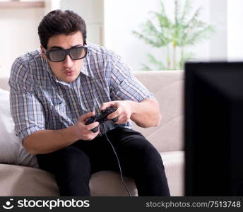 The man playing 3d games at home. Man playing 3d games at home