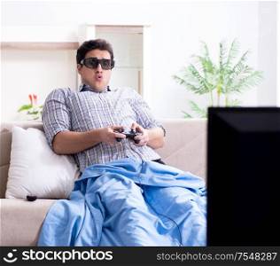 The man playing 3d games at home. Man playing 3d games at home