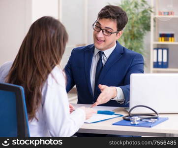 The man signing medical insurance contract. Man signing medical insurance contract