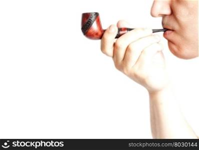 The man smoking tobacco pipe isolated on white background