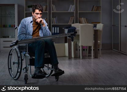 The man suffering from depression at wheelchair. Man suffering from depression at wheelchair