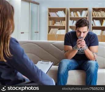 The man suffering from phone dependence visiting doctor. Man suffering from phone dependence visiting doctor