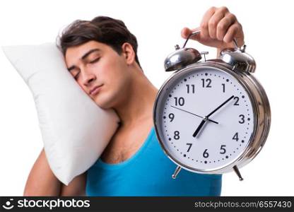 The man waking up with alarm clock isolated on white. Man waking up with alarm clock isolated on white