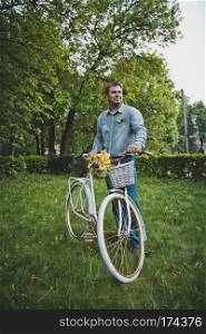 The man with a beautiful bicycle.. The young man with a bicycle 3133.