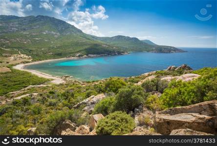 The maquis, beach and sea at the Baie de Nichiareto on the west coast of Corsica