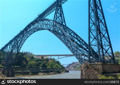 The Maria Pia railway bridge (Ponte Maria Pia) above Douro river, Porto, Portugal. Built in 1877 by Gustave Eiffel.
