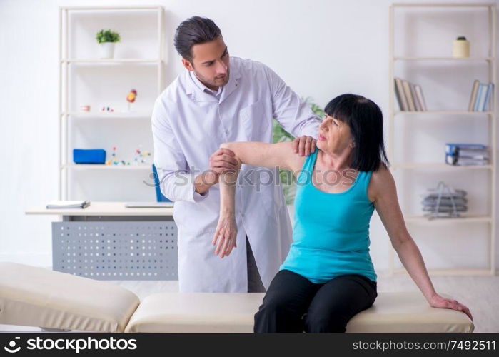 The mature woman patient visiting doctor. Mature woman patient visiting doctor