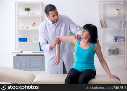 The mature woman patient visiting doctor. Mature woman patient visiting doctor
