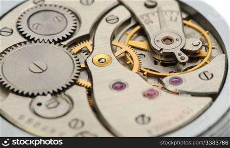 The mechanism of analog hours. A photo close up