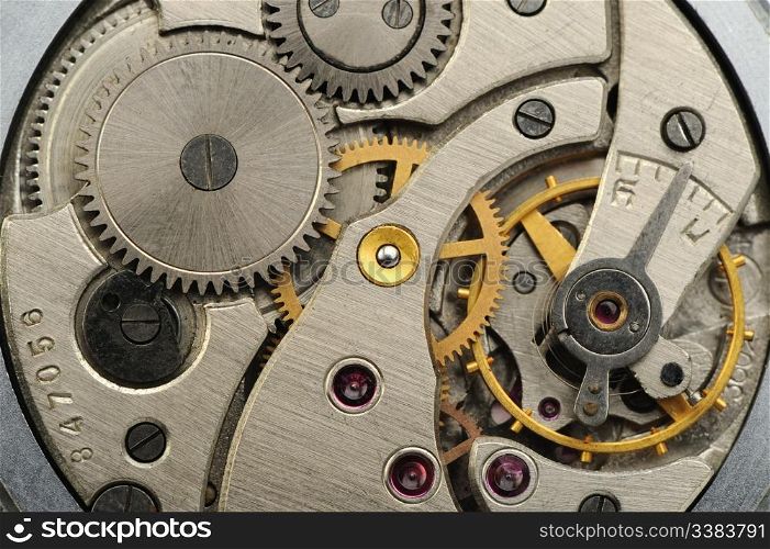 The mechanism of analog hours. A photo close up