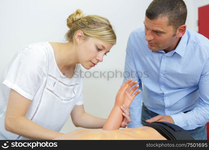 the medical staff practicing cpr