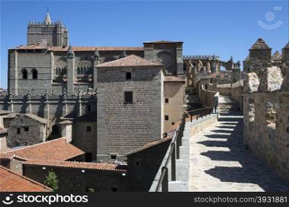 The medieval battlements and the cathedral of the walled city of Avila in the Castile y Leon region of central Spain.