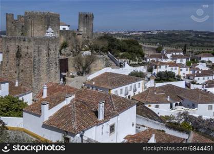 The medieval castle and walled town of Obidos in the Oeste region of Portugal.